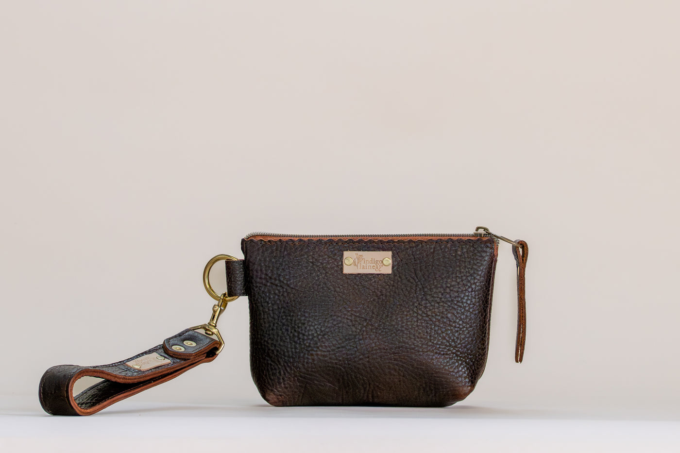 Dark brown pebbled leather zip wristlet pouch