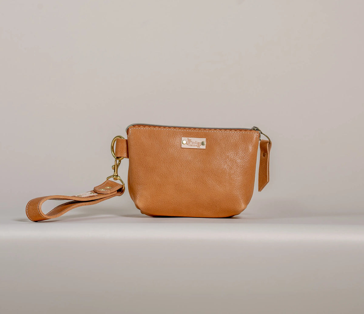 Tan leather zip wristlet pouch