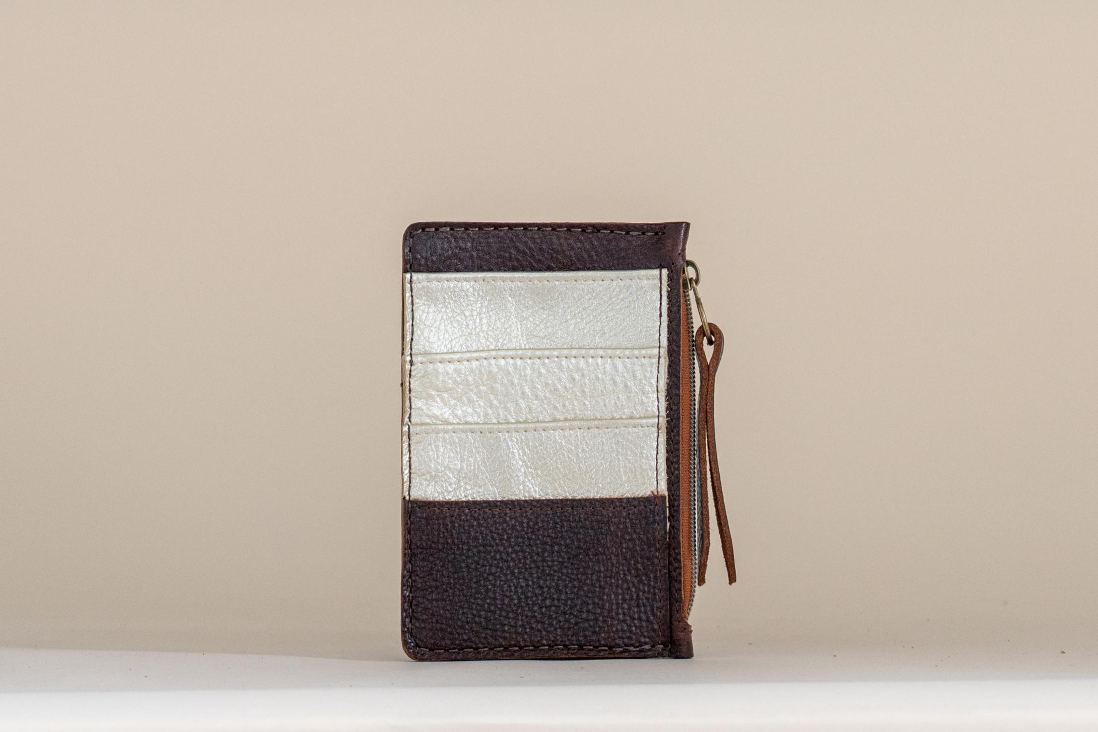The Cami wallet in tobacco leather with card slots and zip closure