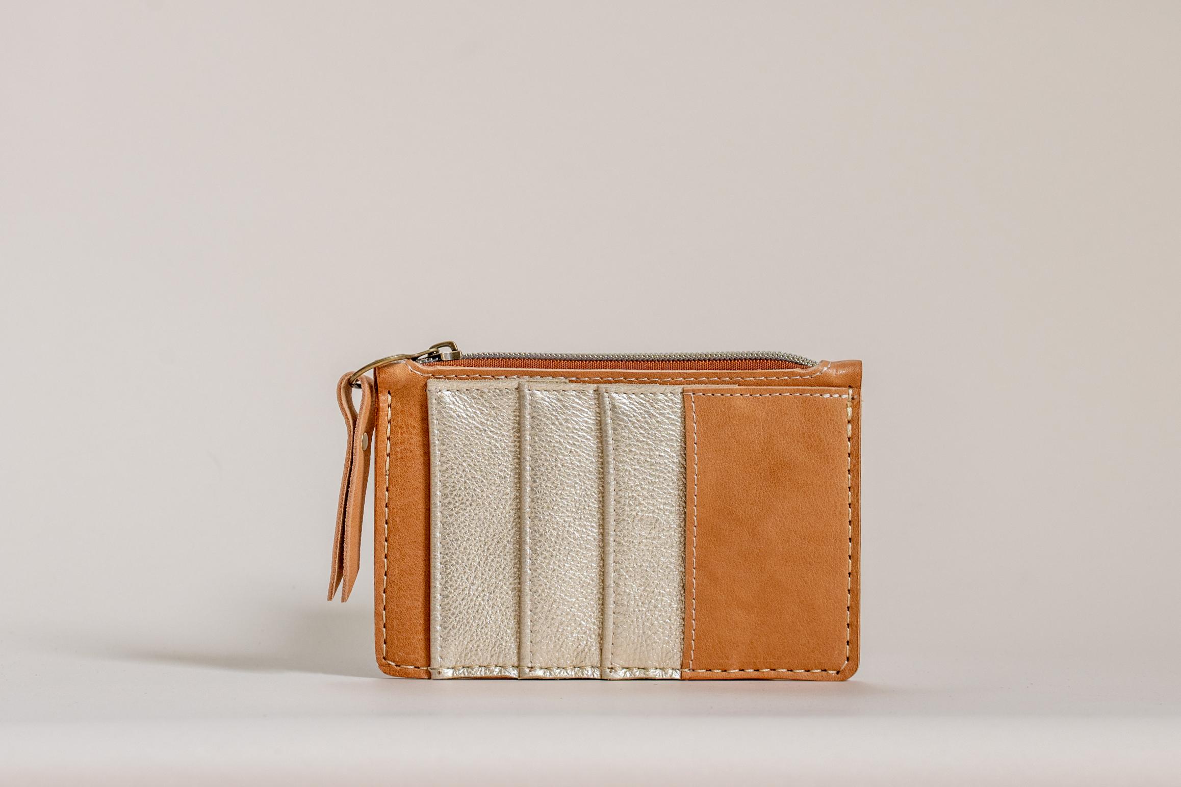 Side view of The Cami wallet's card slots in camel and metallic gold leather