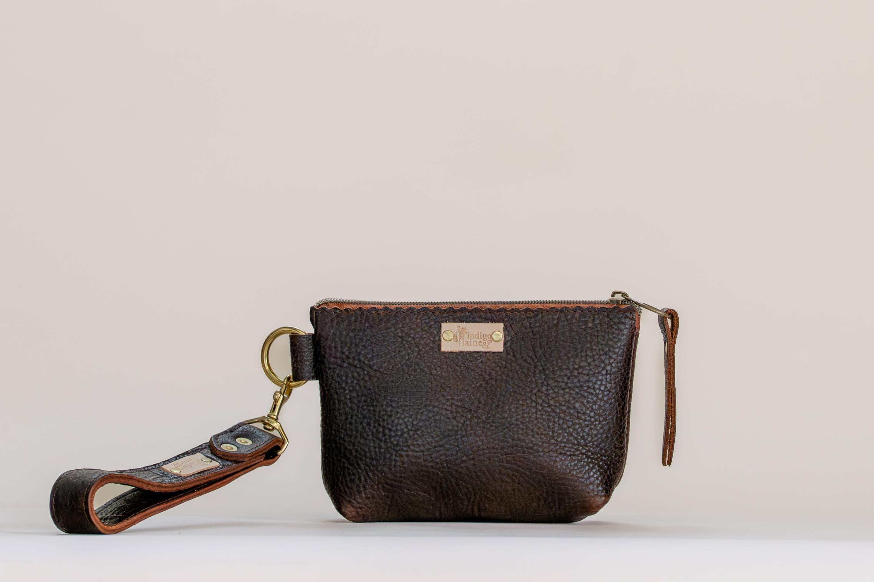 The Sloane wristlet pouch in dark brown leather