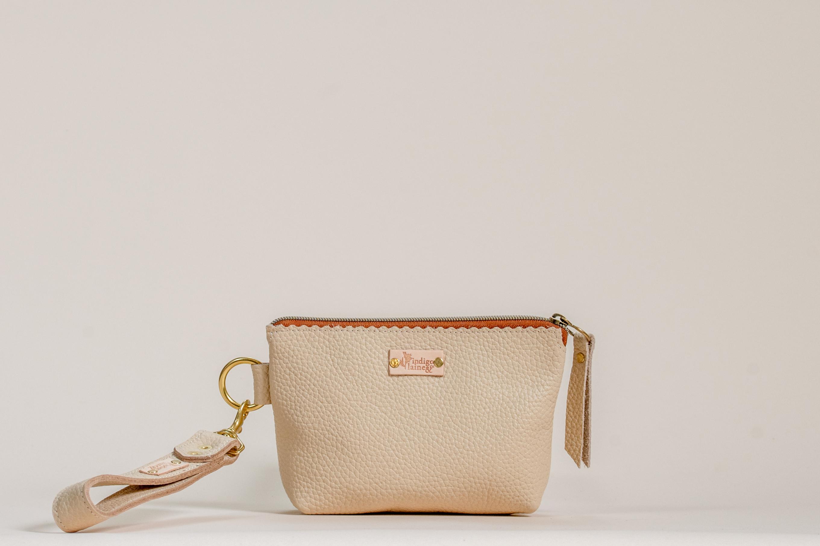 The Sloane wristlet pouch in cream leather