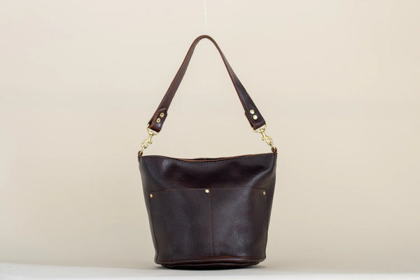 Dark brown leather bucket bag with front pocket