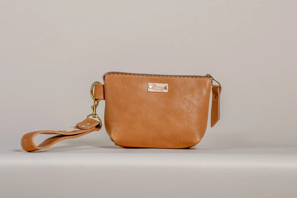 The Sloane wristlet pouch in camel leather
