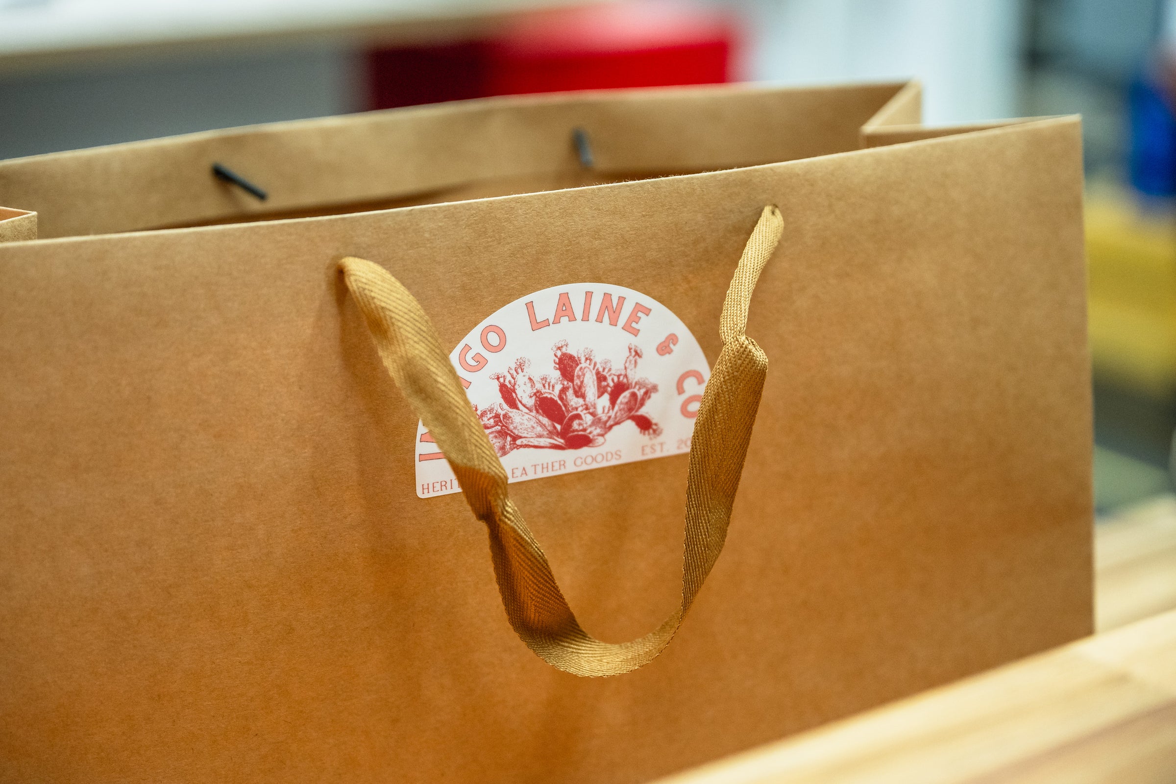 Indigo Laine Leather Goods gift bag close-up
